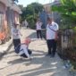 Camat Dringu Pimpin Monev Pembangunan Jalan dan Rumah Warga