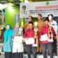 Babinsa Ponoragan Hadiri Penyerahan Piala Lomba Tertib Administrasi dan Bersih Lingkungan Tingkat RT