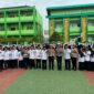 HUT Lalu Lintas Bhayangkara ke-70, Polisi Jadi Pembina Upacara Serentak di Sekolah Pati*