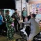 Jaga Ketertiban Masyarakat, Babinsa Koramil Sebulu Lakukan Patroli Siskamling Bersama Warga