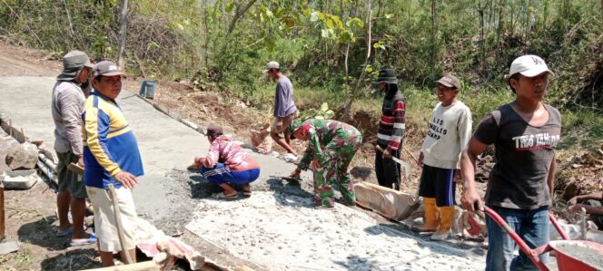 
					Kebersamaan Tanpa Sekat: Babinsa Koramil Leces Pimpin Kerja Bakti Pengecoran Jalan Desa