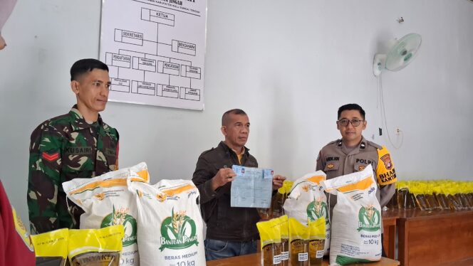 
					Sinergi Babinsa dan Pemerintah Daerah, Bantuan Pangan Beras Tersalur Tertib di Barabai