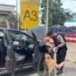 HADIRKAN RASA AMAN, SATGAS GAKKUM DAN UNIT K9 POLDA KEPRI PERIKSA BARANG BAWAAN PENUMPANG DI PELABUHAN RORO PUNGGUR
