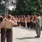 Peran Babinsa dalam Pembinaan Generasi Muda Melalui Kegiatan Pramuka di SMPN 9 HST