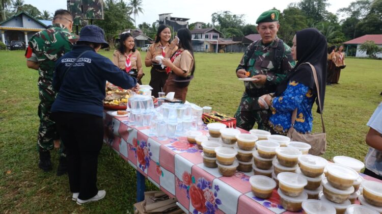 Hangatnya Kebersamaan Anggota Satgas TMMD dan Warga Usai Upacara 17-an