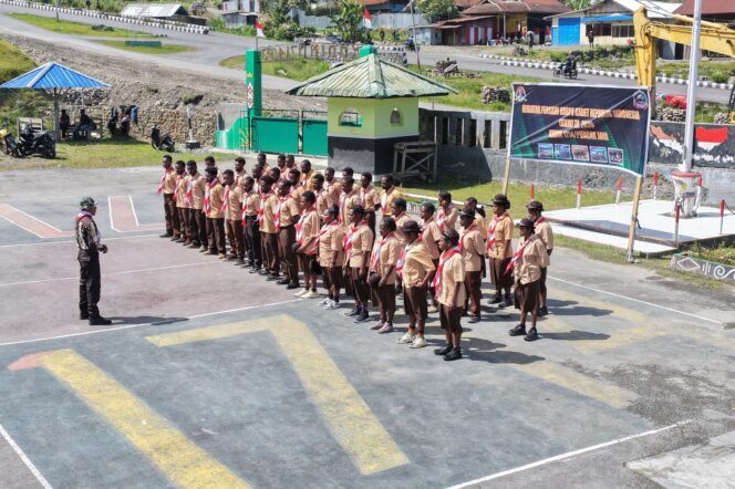 
					Kodim 1714/Puncak Jaya Selenggarakan Kegiatan Persami KKRI Tanamkan Nilai Kebangsaan Pada Siswa SMK Negeri 1 Mulia