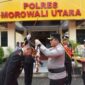 Polres Morowali Utara Gelar Wisuda Purna Bhakti Wakapolres Morowali Utara dengan penuh haru