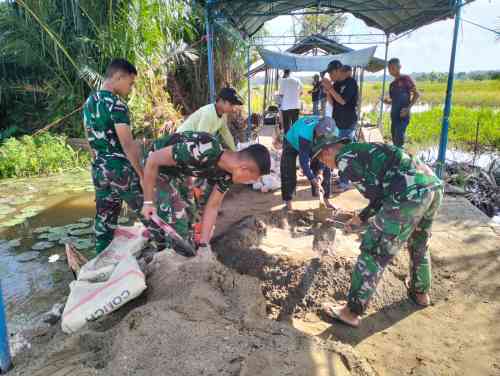 Sinergi TNI-Rakyat Percepat Pembangunan Empat Jembatan di Hulu Sungai Tengah Sinergi TNI-Rakyat Percepat Pembangunan Empat Jembatan di Hulu Sungai Tengah
